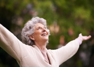 A person with their hands in the air
